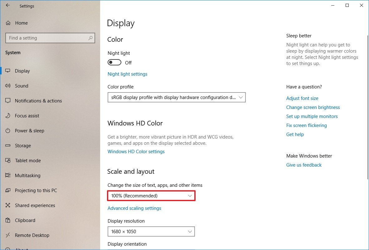 Windows 10 Settings, Display page, with the Scale and layout option "Change the size of text, apps, and other items" highlighted and set to 100% (Recommended)